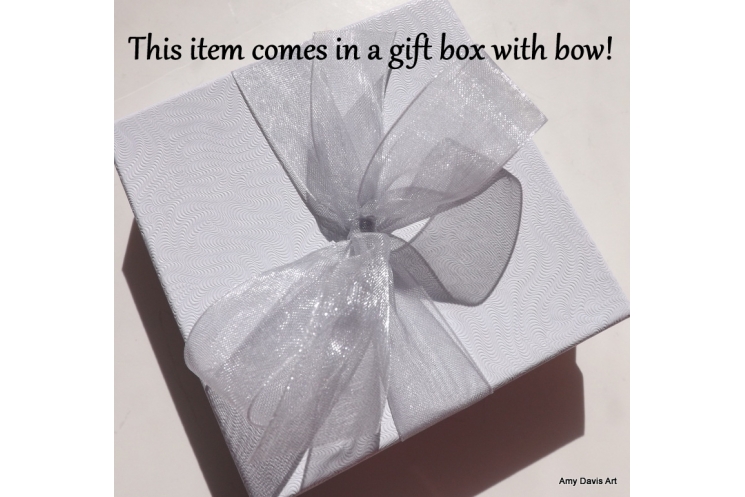Gift box and bow included with your order